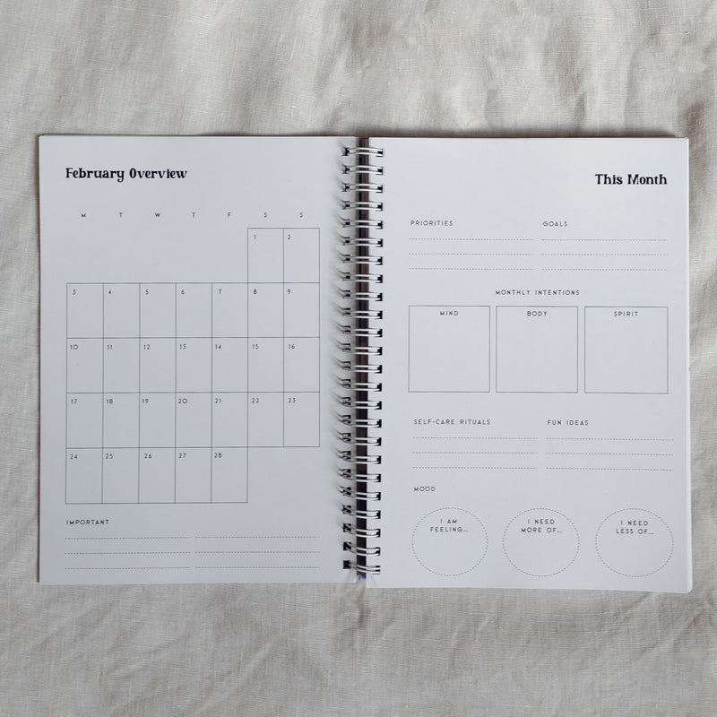 monthly overview page for 2025 conscious mae diary planner