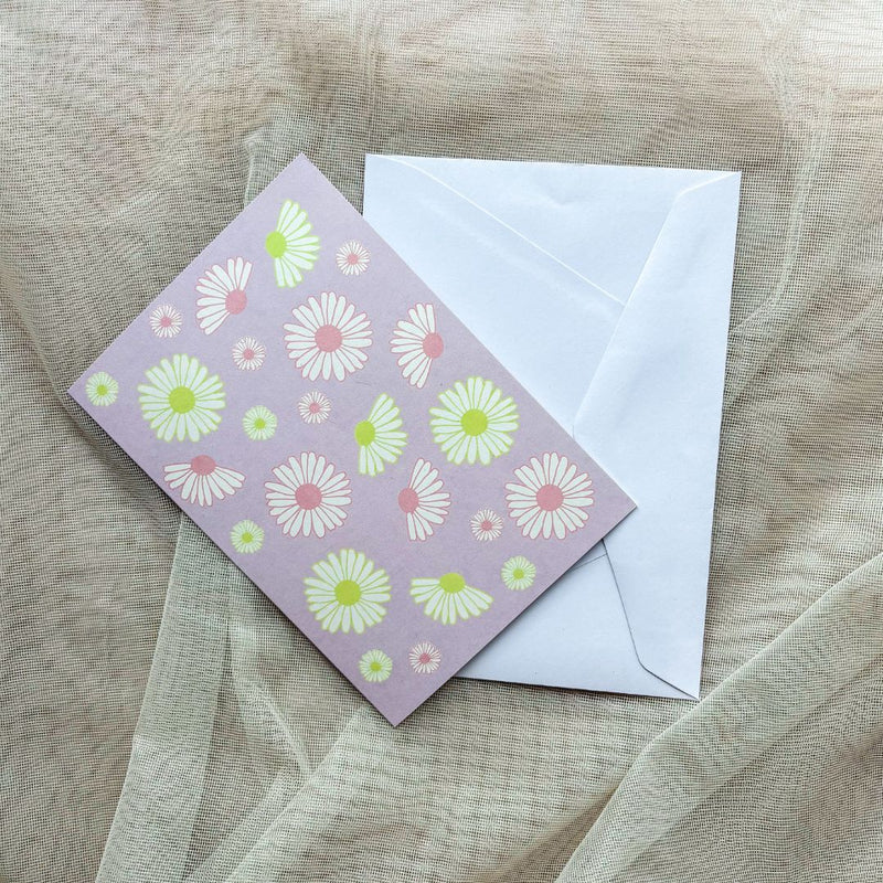 Pastel daisy recycled paper greeting card.